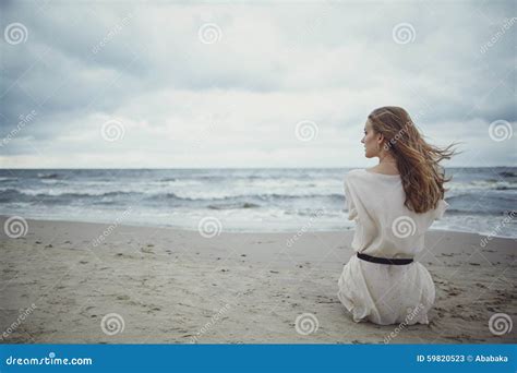 Beautiful Alone Nude Brunette Woman Wrapped In A Plaid On The Balcony Of Her Bedroom With A Cup