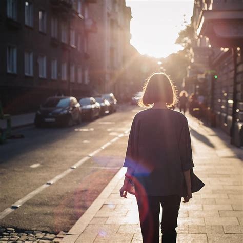 “strolling Through The City Streets The Long Shadows Keep Stretching