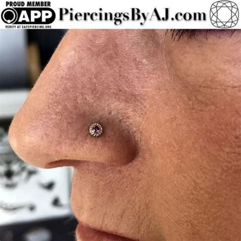 Fully Healed Nostril Piercing Featuring An 18k White Gold Purity With A