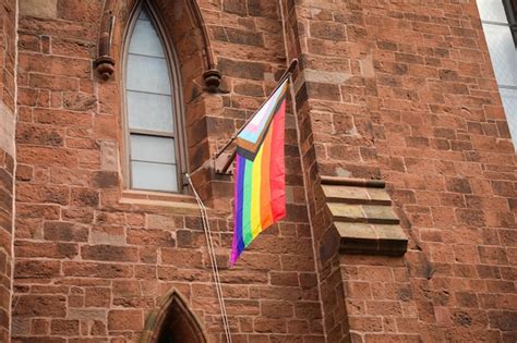 Premium Photo Vibrant Gay Pride Rainbow Flag Intertwines With