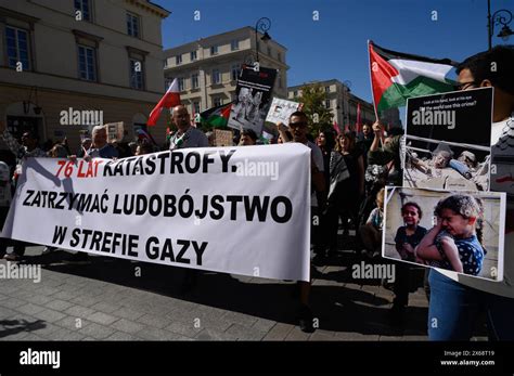 Solidarity With Palestine Rally In Warsaw People Carry A Banner That