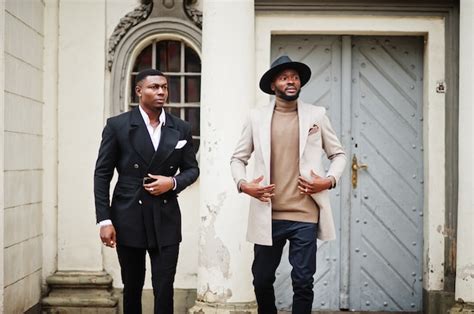 Premium Photo Two Fashion Black Men Walking On Street Fashionable