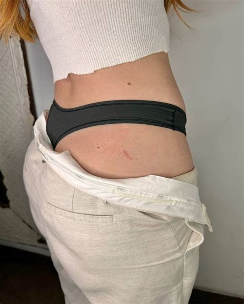 Tiny Minimalistic Red Chili Tattoo Placed On The Hip