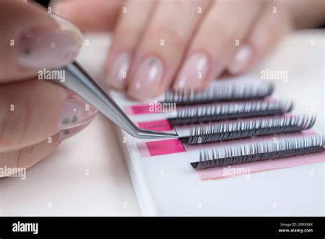 Eyelash Extension Procedure Close Up Of A Master At Work Artificial