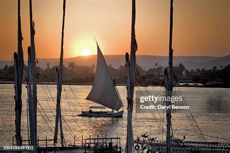 Egypt Aswan Nile River Felucca At Sunset Photos and Premium High Res ...