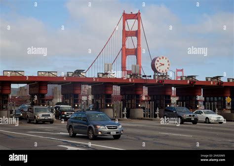 Drivers Make Their Way Past Toll Booths At The Golden Gate Bridge In