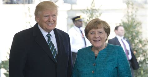 Donald trump Angela Merkel handshake is as awkward as it sounds.