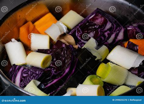 Cooking Vegetables In A Saucepan Homemade Winter Soup With Red Cabbage