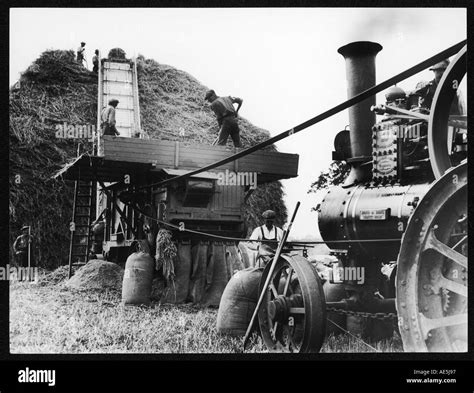 1930s threshing wheat Black and White Stock Photos & Images - Alamy