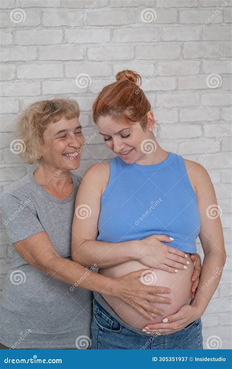 Elderly Woman And Her Adult Pregnant Daughter Stock Image Image Of