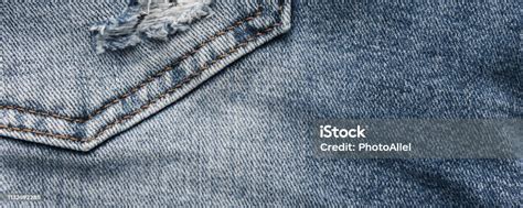 Denim Blue Jeans Texture With Scuffs And Holes Abstract Background