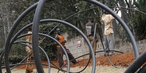 Workers Lay Fibre Optic Cable In Nairobi Liquid Telecom Has Set Up An