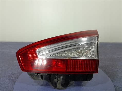 FORD MONDEO MK4 LIFT KOMBI LAMPA TYŁ PRAWA W KLAPĘ VABMMX 13A602 BA za