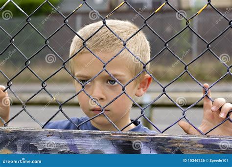 Child Through Fence Royalty Free Stock Image - Image: 10346226