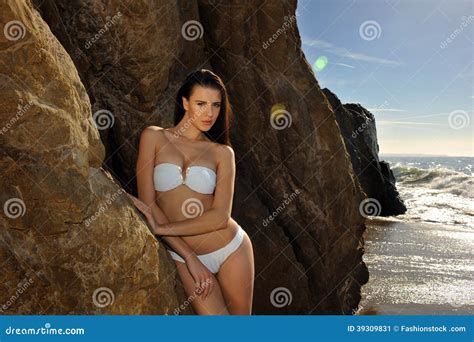 Bikini Model Posing In Front Of Rocks Stock Image Image Of Beach