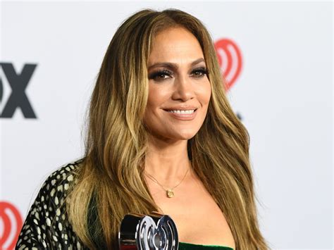 Jennifer Lopez Shows Off Her Killer Curves In Plunging Gown Photos