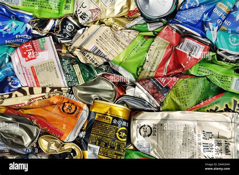 Compressed Japanese Beer And Drinks Metallic Cans Ready For Recycling