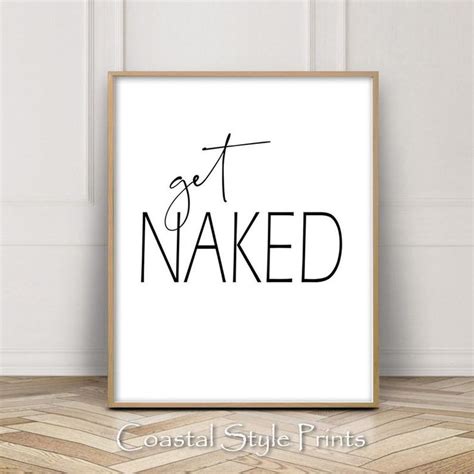 A Framed Poster With The Words Get Naked On It In Black And White