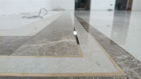 Brass Inlay Work In Marble Flooring Flooring Blog