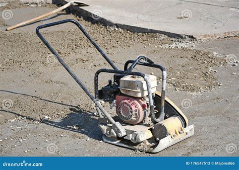 Soil Compactor At The Road Construction Stock Image Image Of Sign
