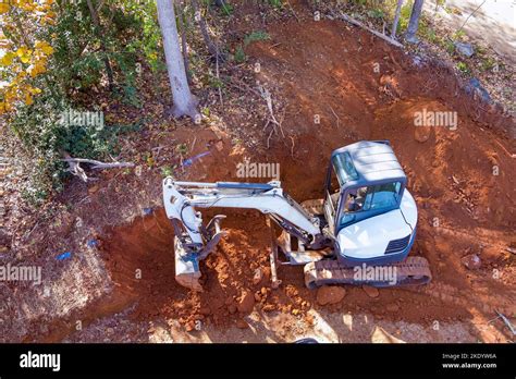 During Earthmoving Works At Construction Site Crawler Excavators