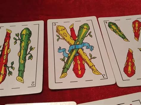 El significado del Tres de Bastos en el tarot de baraja española