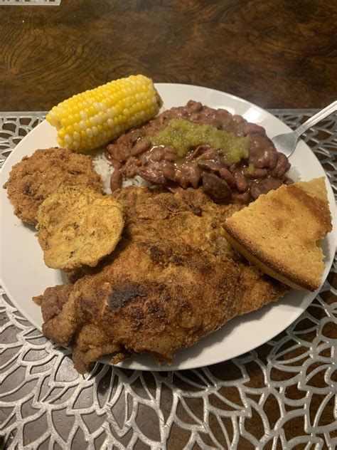 [homemade] Red Beans And Rice Fried Pork Chop And Eggplant Fresh Picked Corn And Cornbread