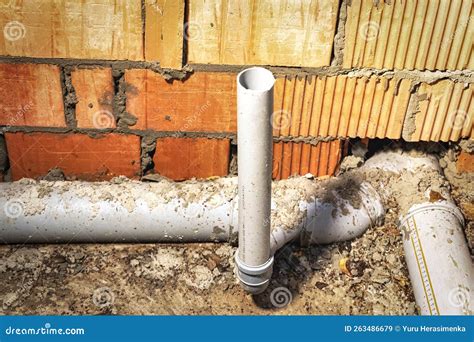 Sewer Pipes In Home Basement System Of Gray Sanitary Pipes When