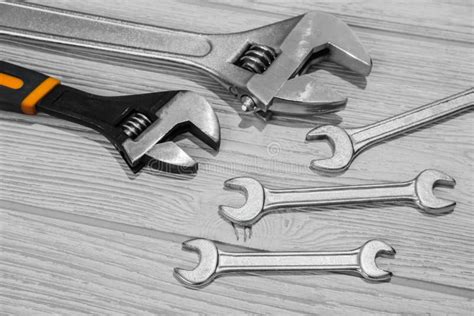 Adjustable Spanners and Wrenches, Nuts and Bolts on the Table Stock Photo - Image of repair ...