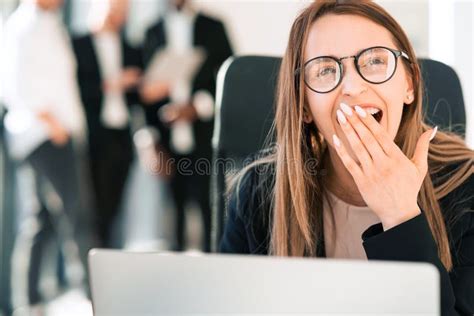 Joyful Office Worker Laughing At Hilarious Meme On Computer Stock