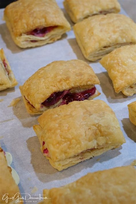 Cherry Cream Cheese Puff Pastry Are Baked In The Oven Separated Into