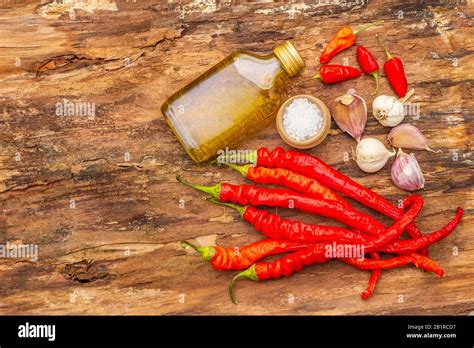 Red And Orange Chili Pepper With Garlic Cooking Food Background