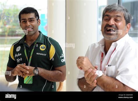 Indian Formula One Testdriver Karun Chandhok L And His Father Of