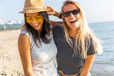 A Picture Of A Group Of Women Having Fun On The Beach Stock Image