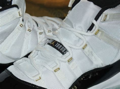 Air Jordan XI DMP "Gold Eyelet" Sample - SneakerNews.com