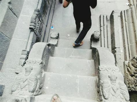 Premium Photo Low Section Of Man Walking On Steps