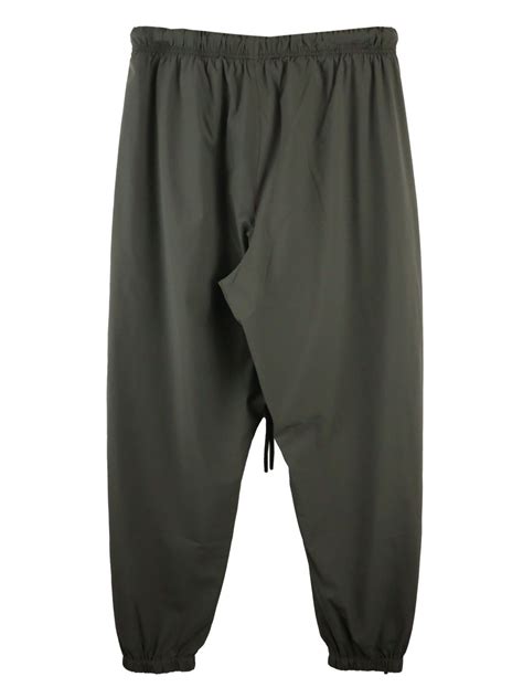 Fear Of God Essentials Drop Crotch Track Pants Green Farfetch Uk