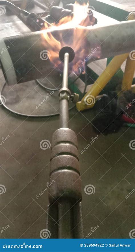 The Pipe is Burned Using a Nozzle To Heat Up To 300 Degrees Celsius for ...