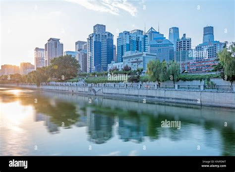 Downtown City Skyline Along The River In China Stock Photo Alamy