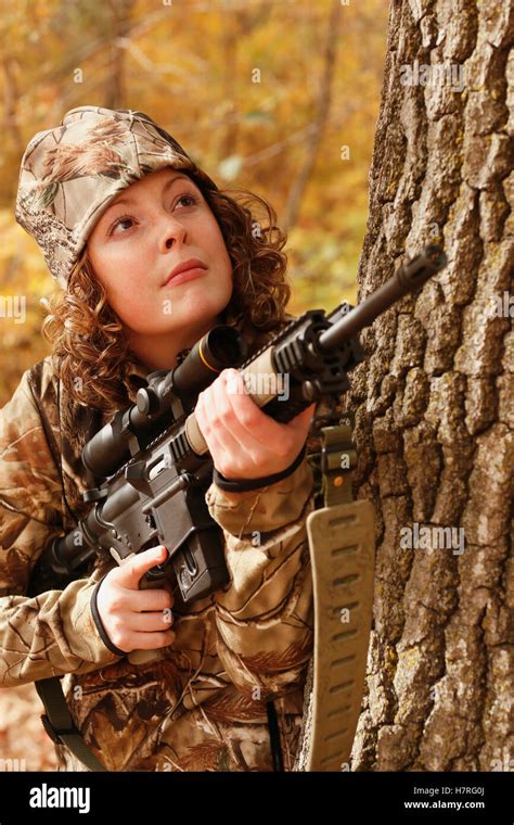 Female Hunter Hunts Small Game Stock Photo Alamy