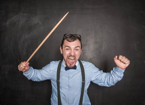 Angry Teacher With Wooden Stick Stock Photos Pictures And Royalty Free