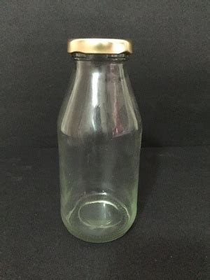 Ml Transparent Glass Bottle With Golden Black Lug Caps At Rs