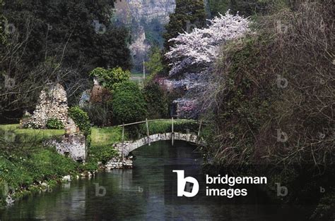 Image Of Ponte Sul Fiume Ninfa Giardini Di Ninfa Oasi Wwf Cisterna