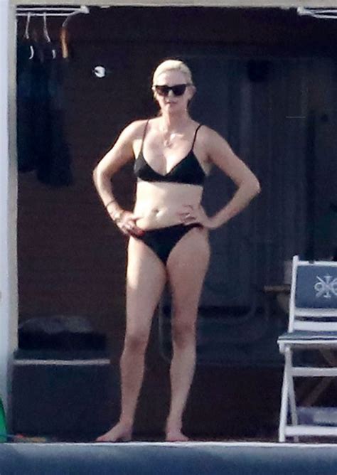 Charlize Theron Showed A Tight Ass In A Bikini While Relaxing On A