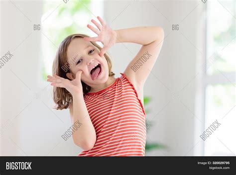 Child Funny Face Kid Image And Photo Free Trial Bigstock