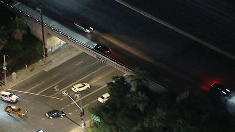 Grand Theft Auto Suspect Drives Wrong Way Down 405 Fwy In Van Nuys Then Runs Across On Foot