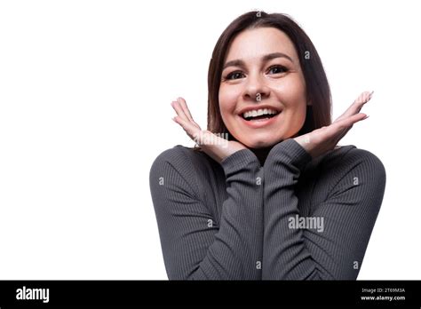 25 Year Old Woman With Black Hair Smiling On White Background With Copy