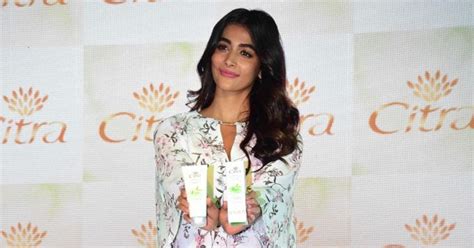 DESI ACTRESS PICTURES Actress Pooja Hegde Hot Thigh Cross Legs Stills Desipixer