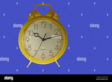 Yellow Alarm Clock Stock Photo Alamy