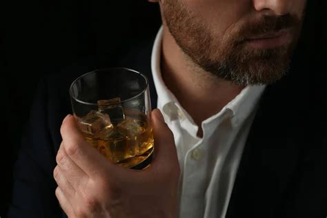 Handsome man drinking whiskey Stock Photos, Royalty Free Handsome man ...